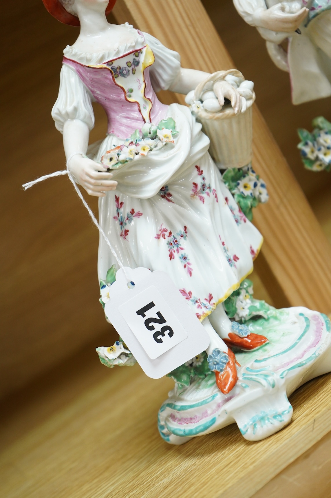 A Derby figure of a gentleman, c.1760, and a Continental porcelain figure, pseudo Bow mark, tallest 26cm high (2)